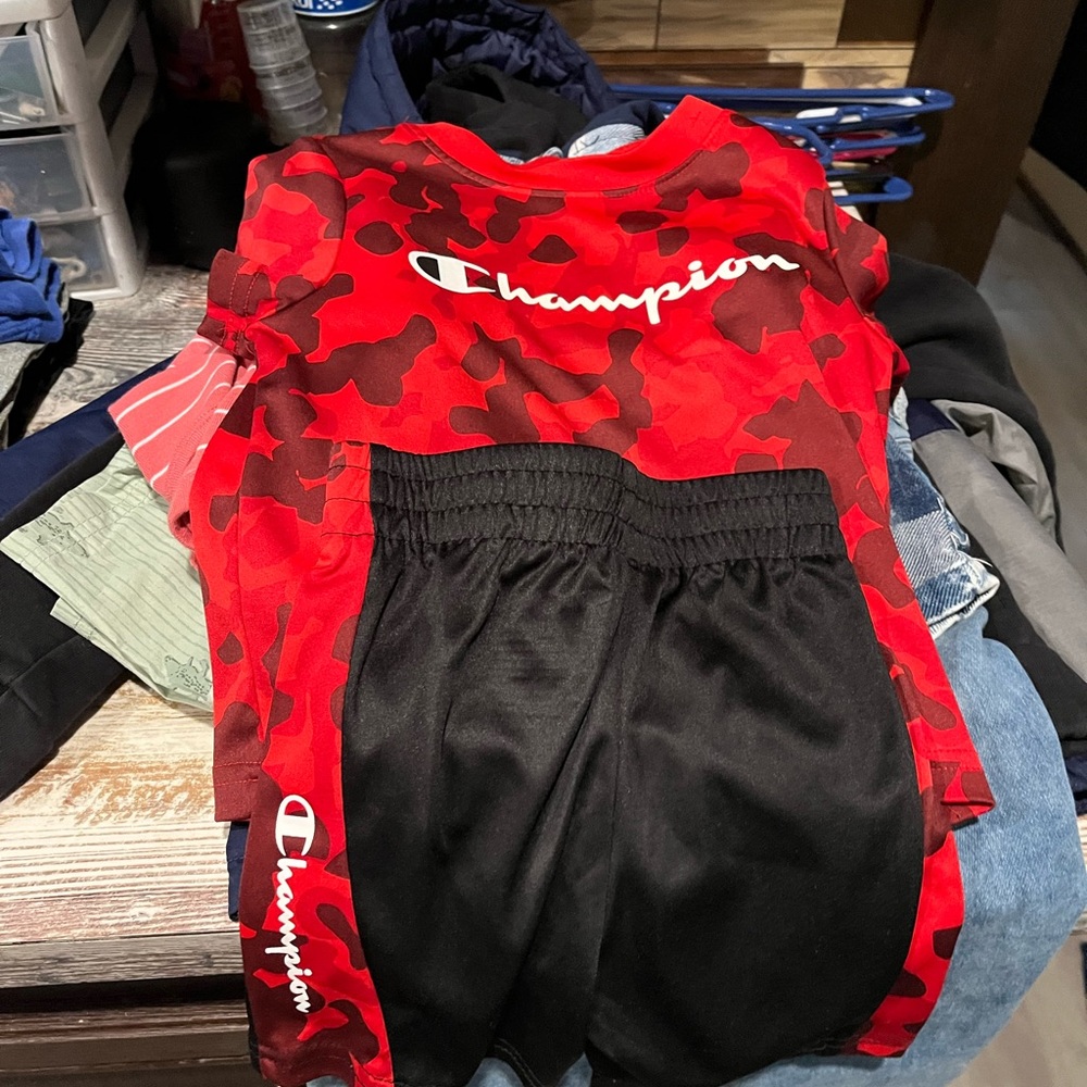 Champion Red Camouflage Tee and Black Shorts